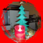 Kerze und Weihnachtsbaum